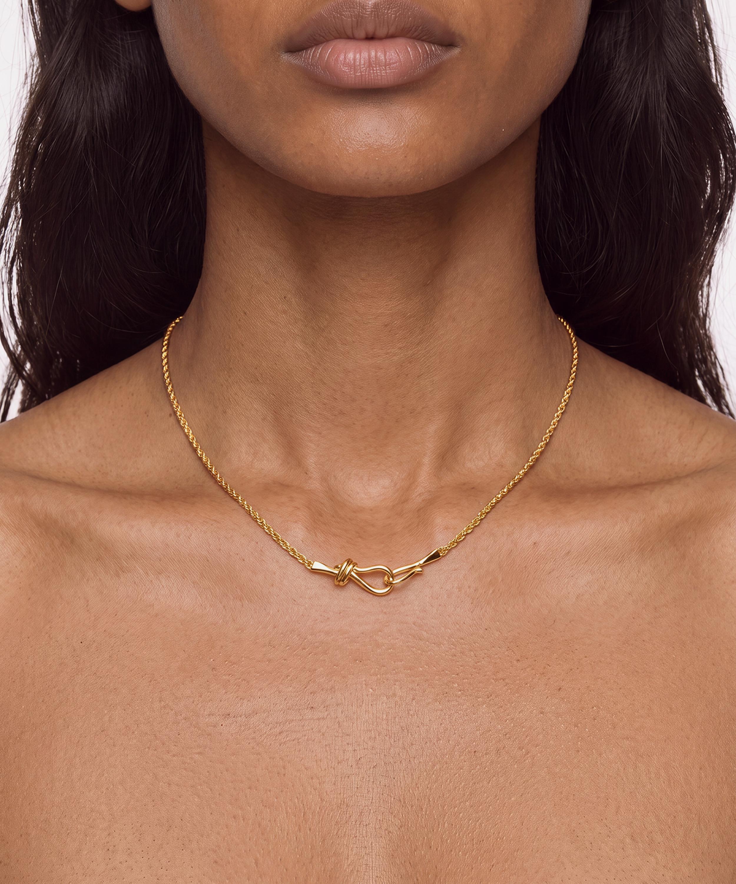 SHASHI - Gold-Plated Olympia Knot Necklace image number 1