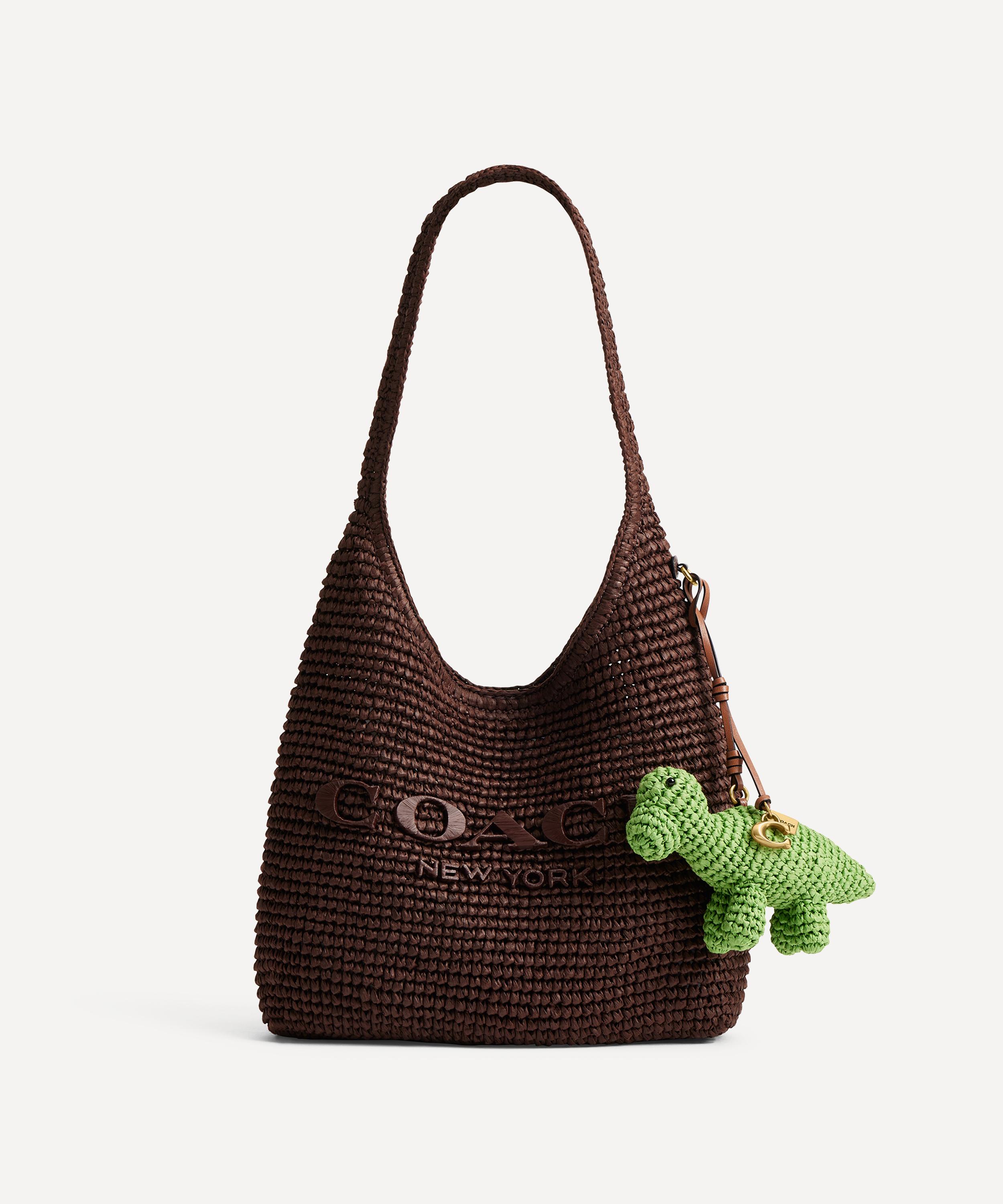 Coach - Straw Dino Bag Charm image number 1