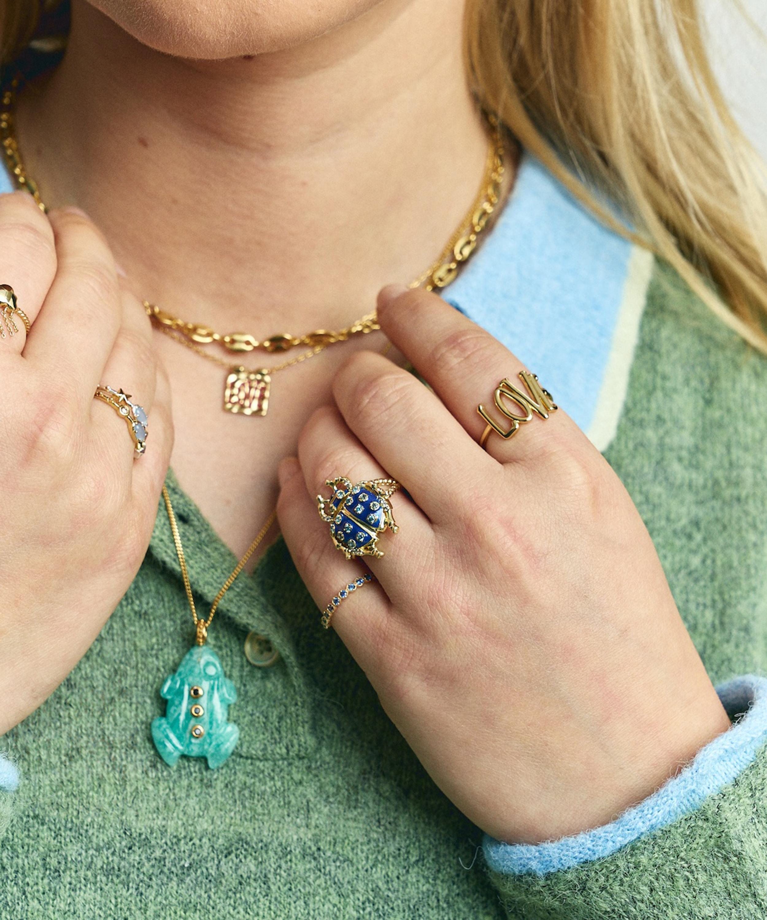 Anna + Nina - Gold-Plated Bugging You Ring image number 1