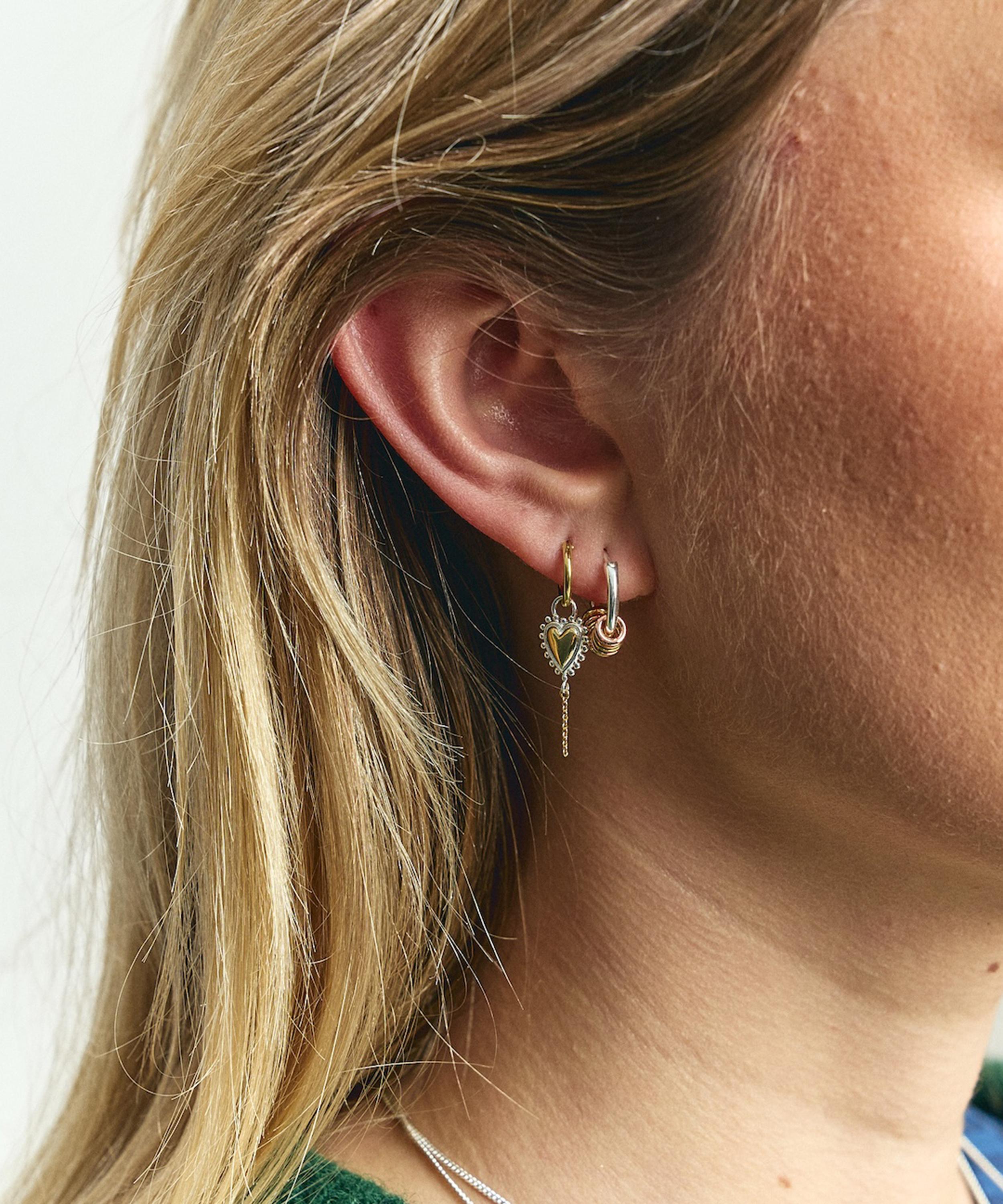 Anna + Nina - Gold-Plated Single Bravery Heart Hoop Earring image number 1