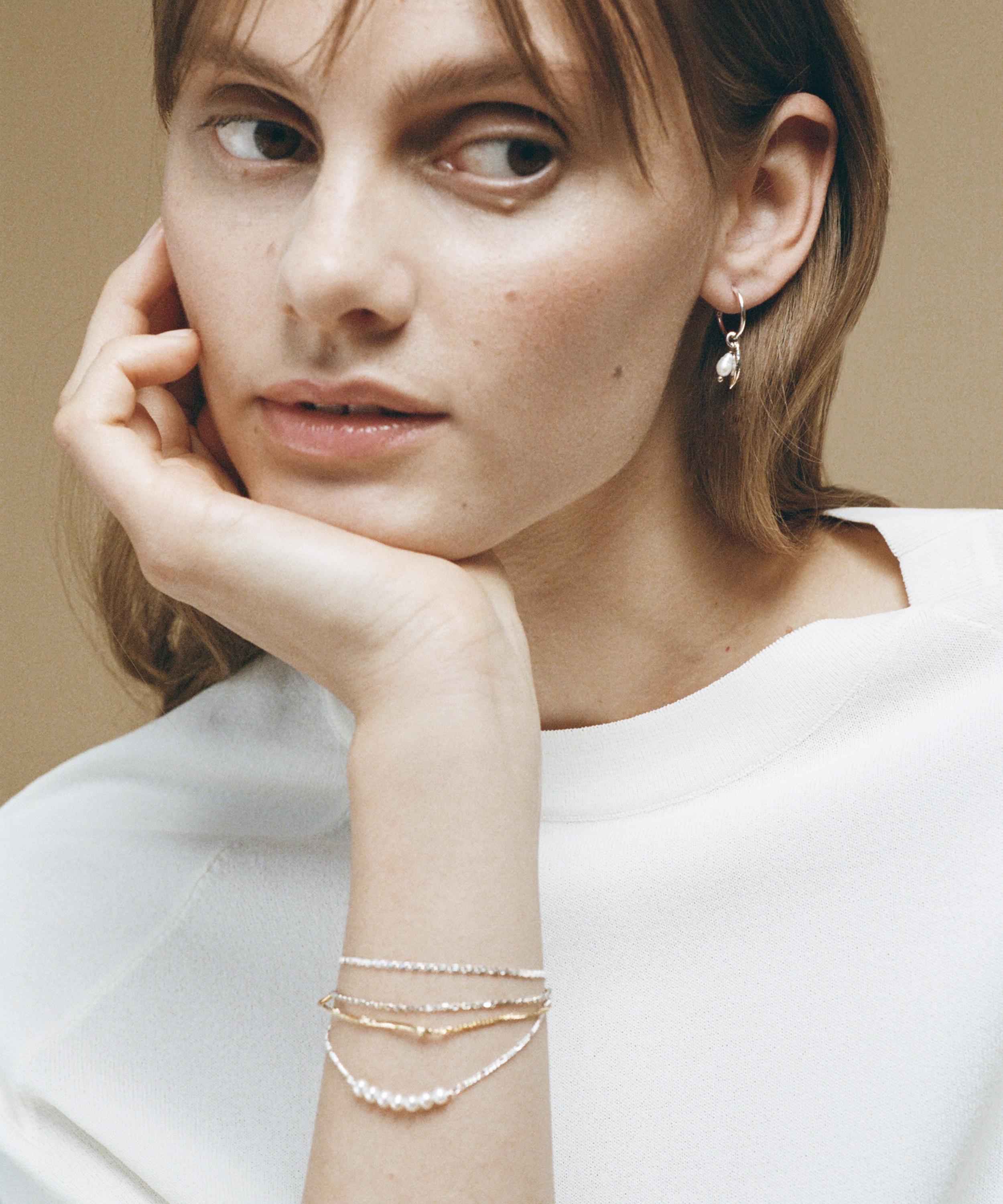 Wouters & Hendrix - Gold-Plated Silver Branch and Pearl Bracelet image number 1