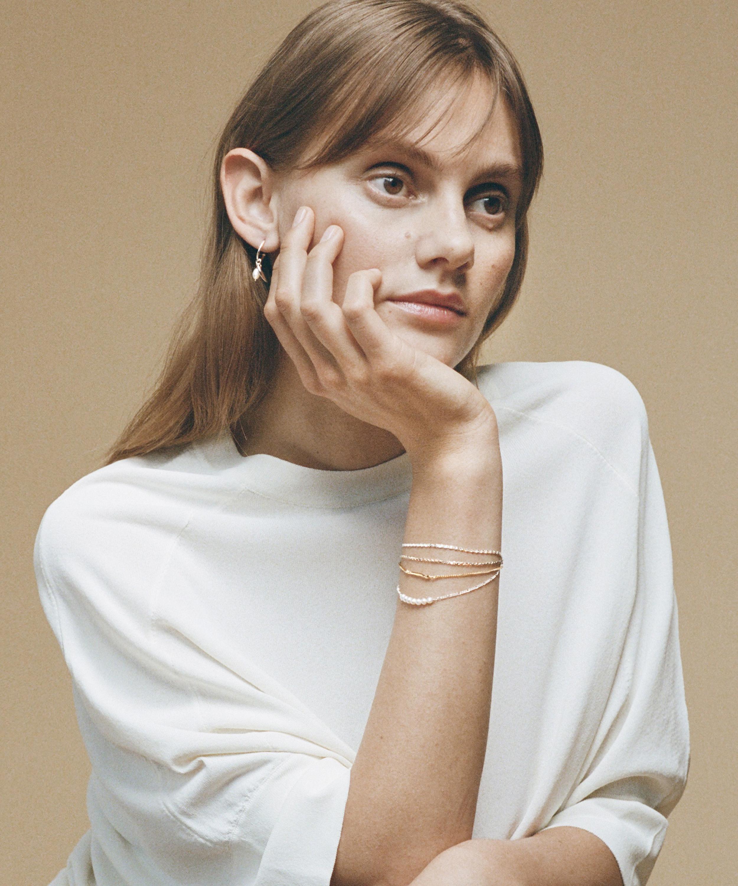 Wouters & Hendrix - Gold-Plated Silver Branch and Pearl Bracelet image number 2