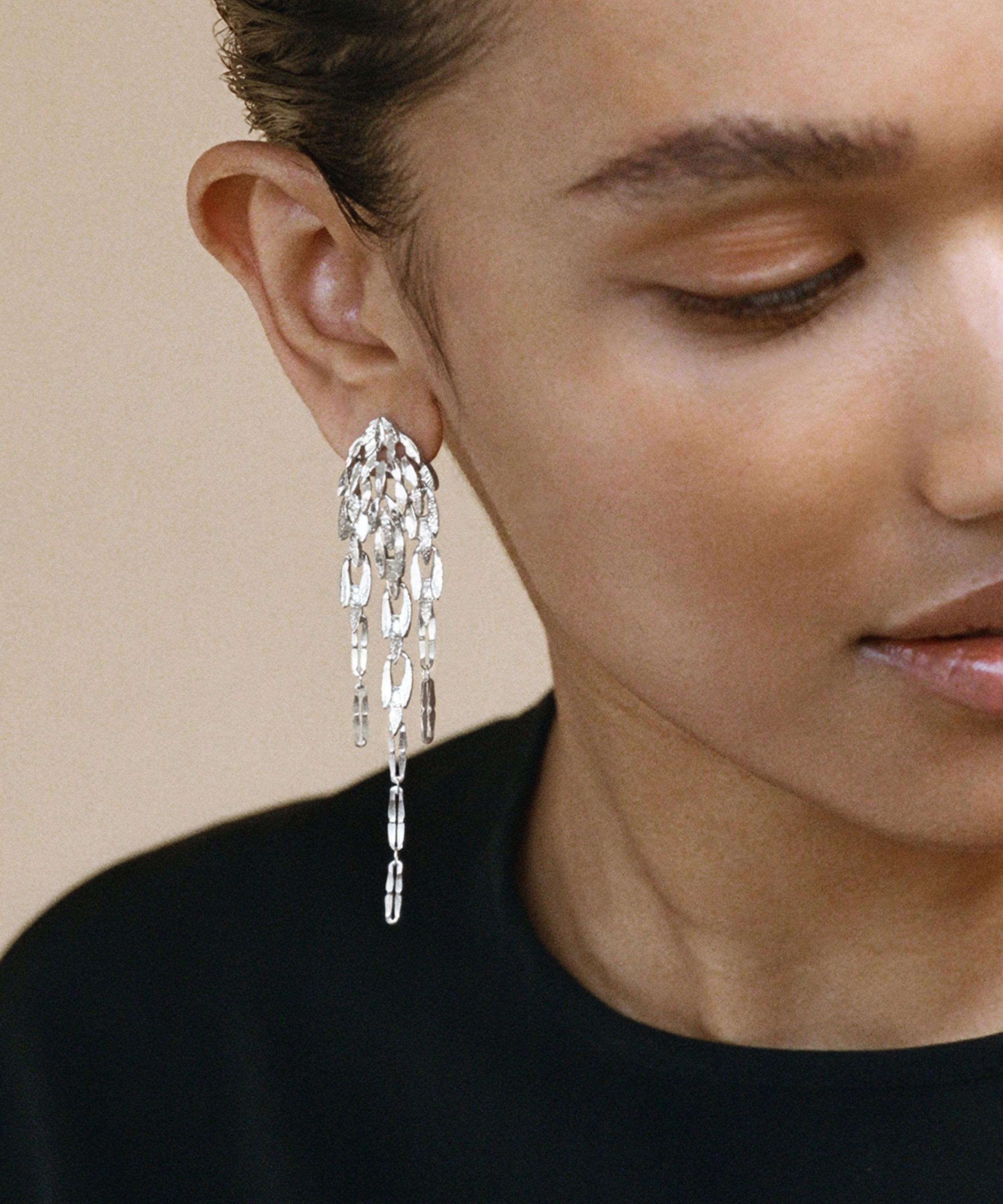 Wouters & Hendrix - Silver Dangling Leaf Stud Earrings image number 1