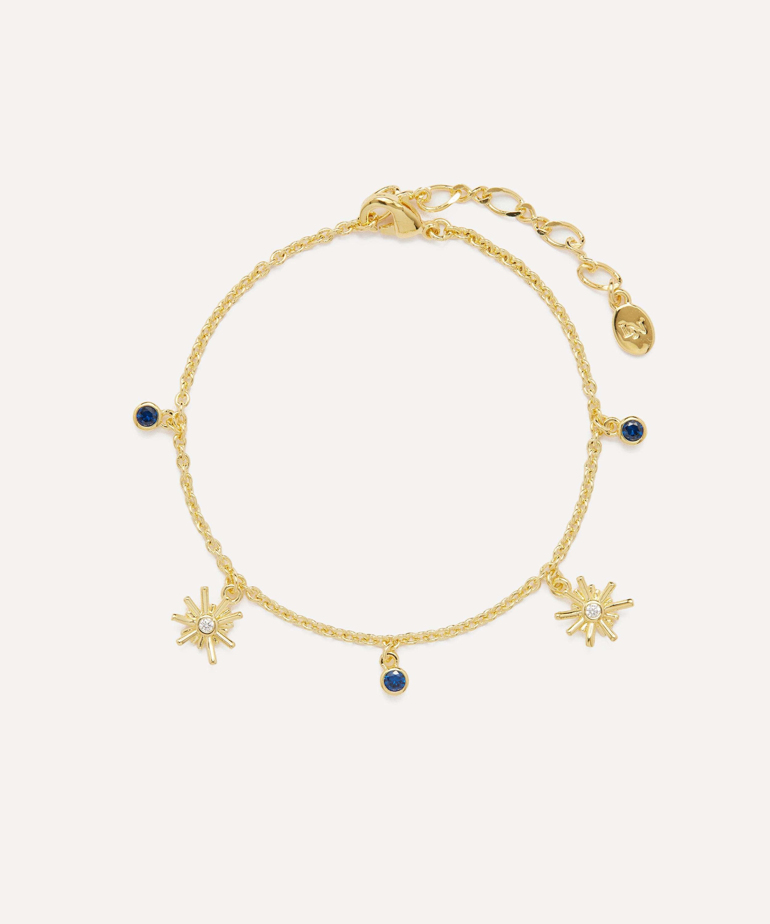 Les N&eacute;r&eacute;ides - Gold-Tone Gold Stars and Midnight Blue Stone Charm Bracelet image number 0
