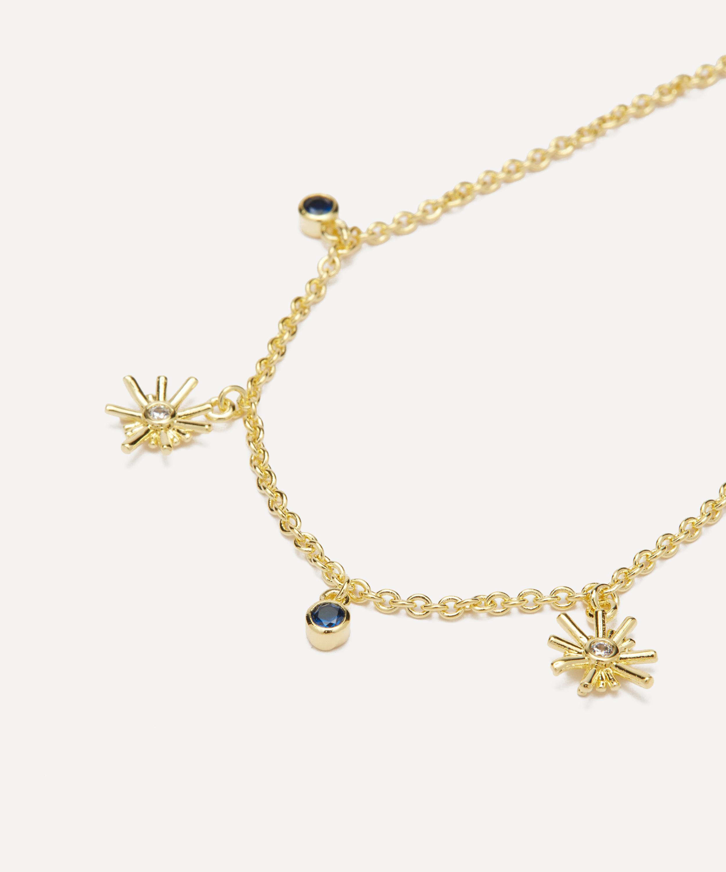Les N&eacute;r&eacute;ides - Gold-Tone Gold Stars and Midnight Blue Stone Charm Bracelet image number 1