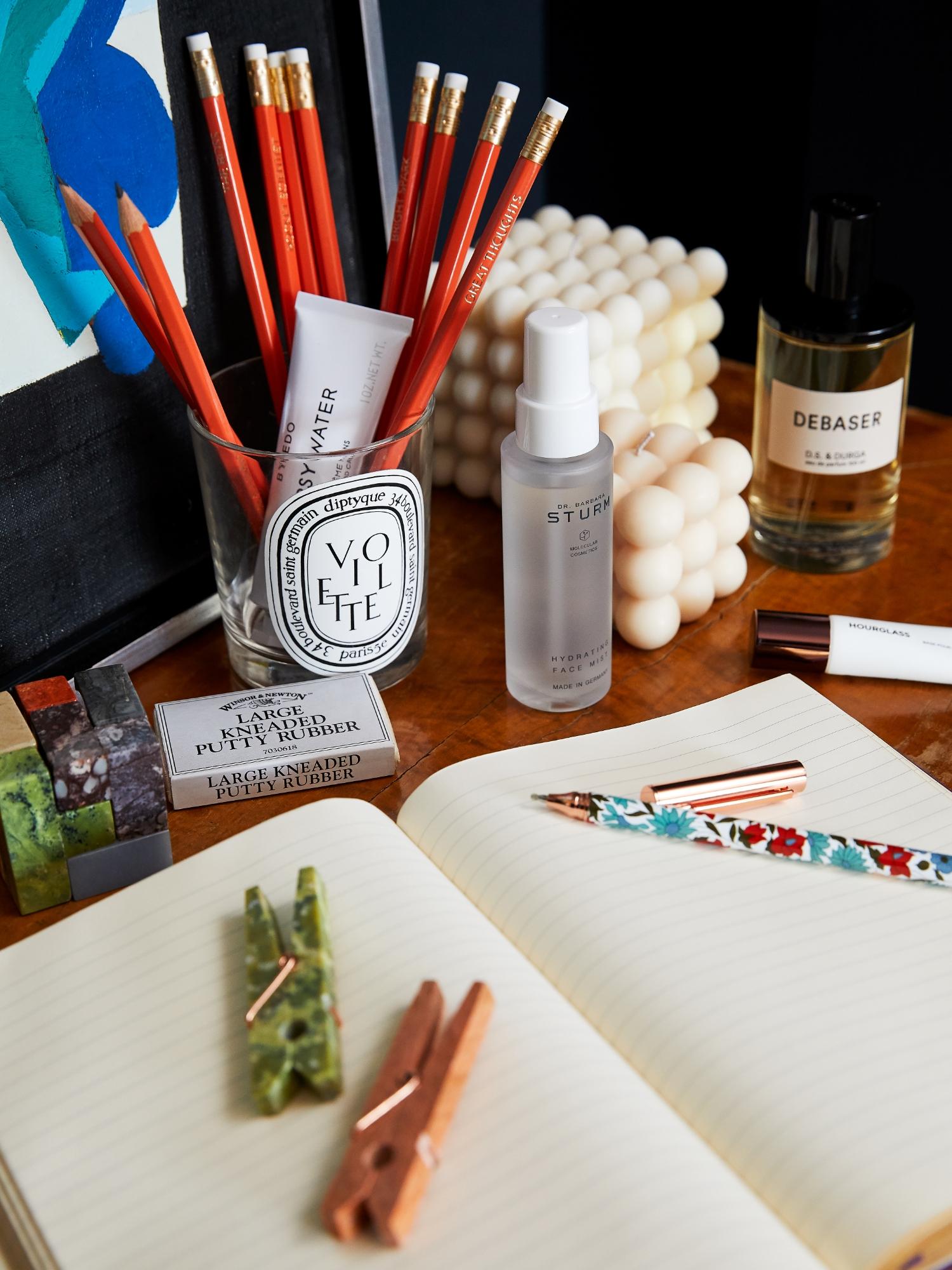 Beauty products on office desk