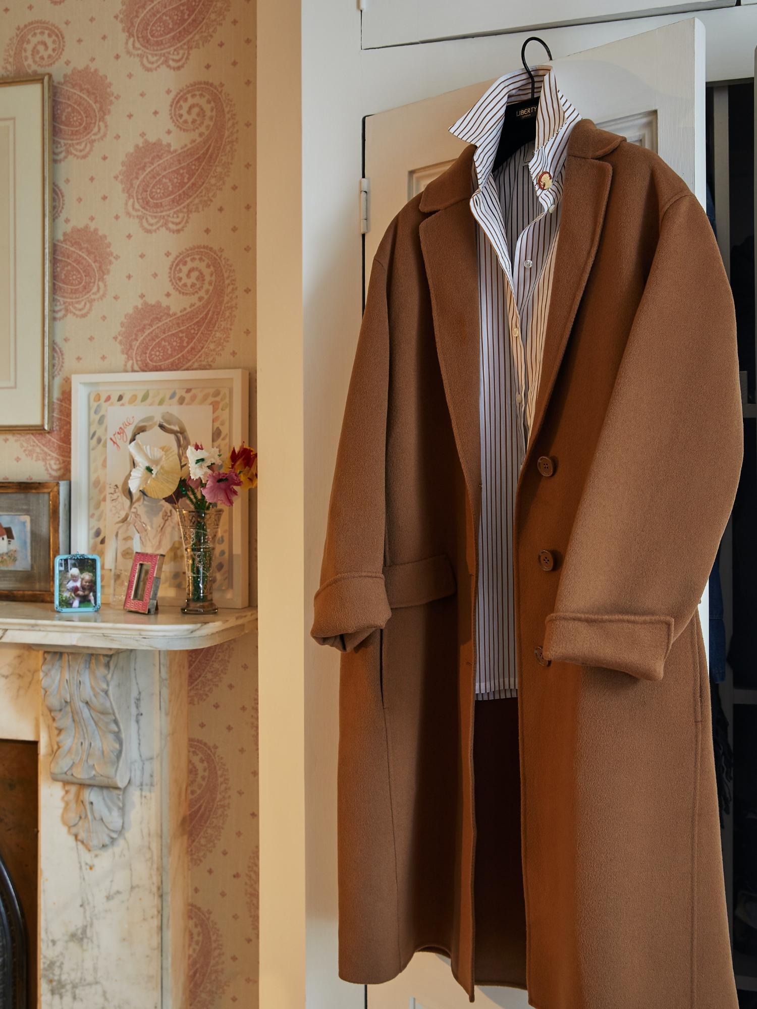 at home with bay garnett - coat hanging over back of door