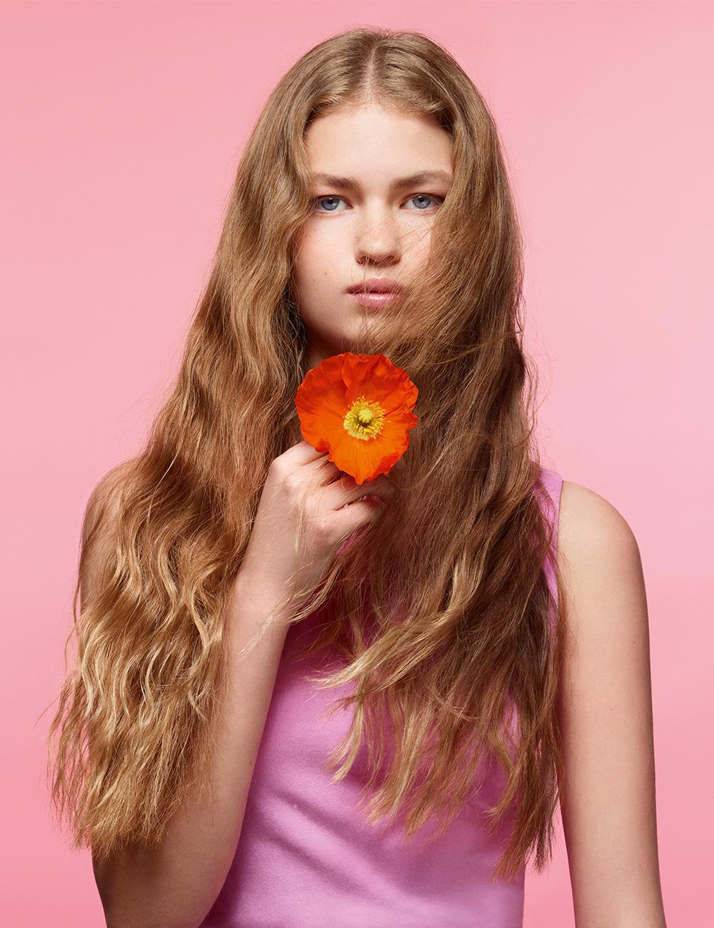 Woman with wavy blonde hair