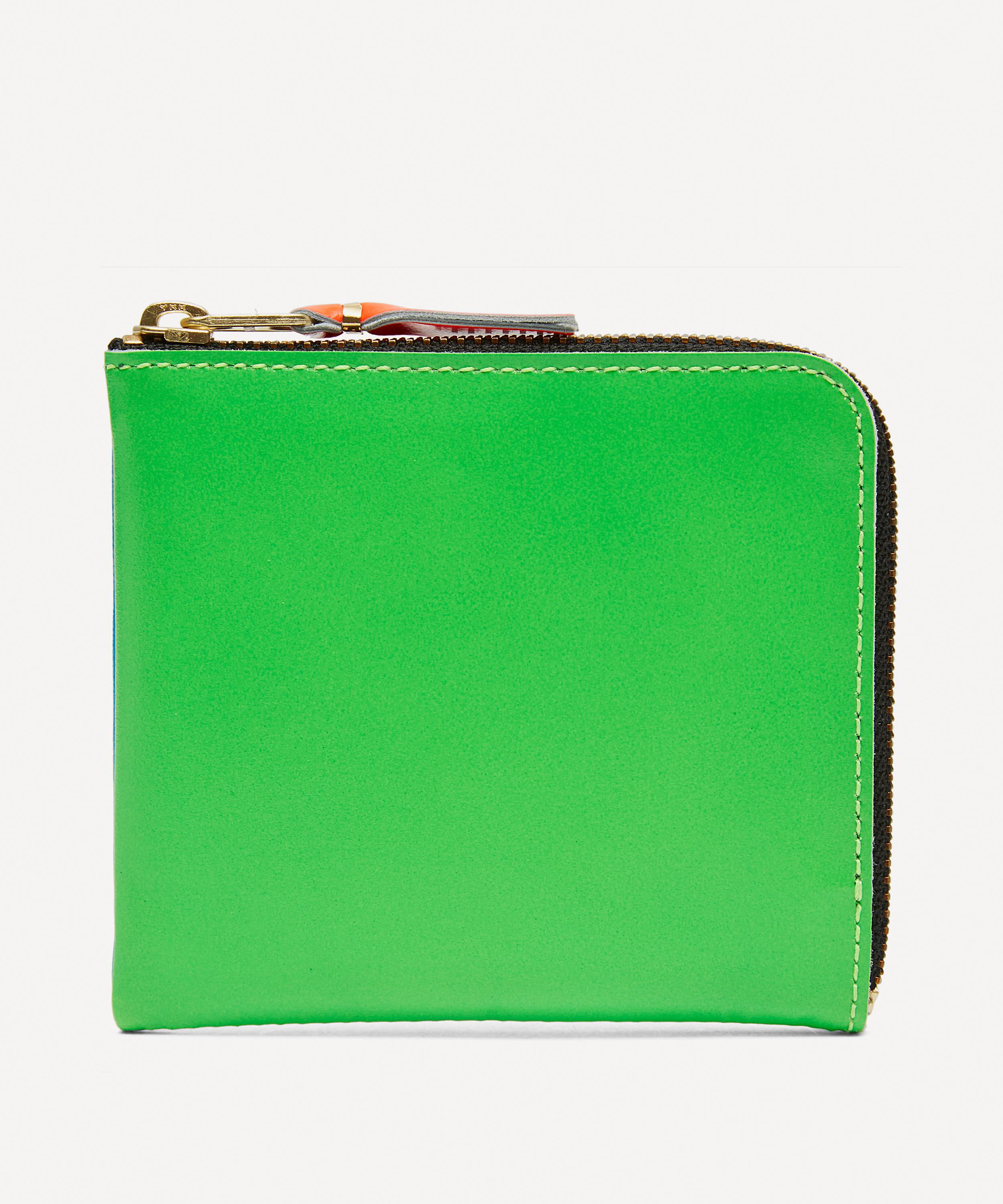 comme des garcons fluorescent wallet