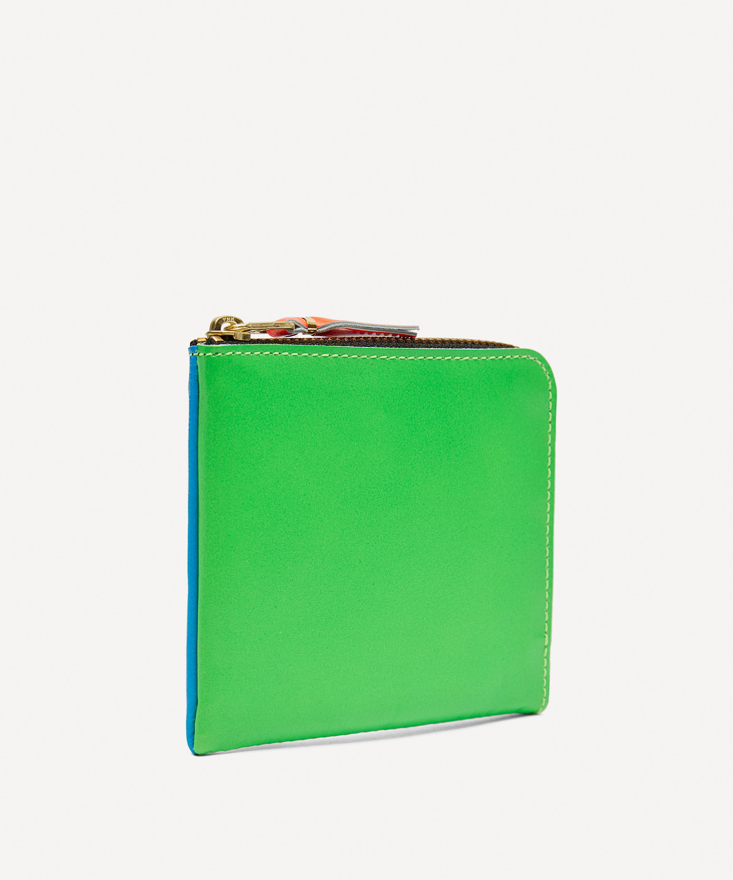 comme des garcons fluorescent wallet