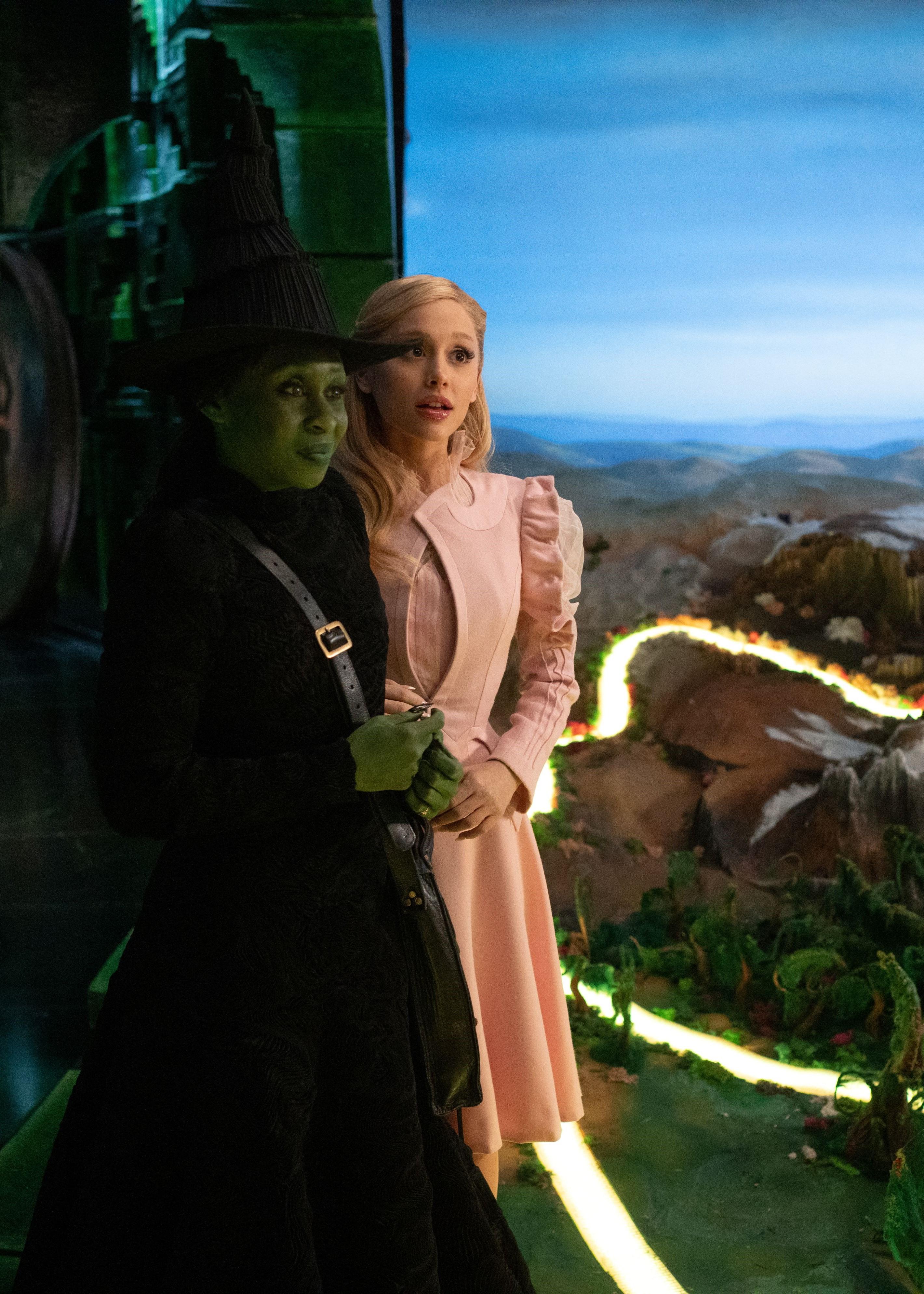 Cynthia Erivo as Elphaba and Ariana Grande as Glinda
