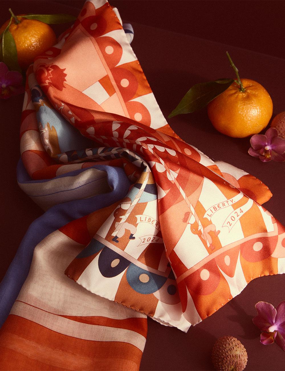 https://i8.amplience.net/i/liberty/lunar-new-year-gifts-scarves-foled?fmt=auto&qlt=75
