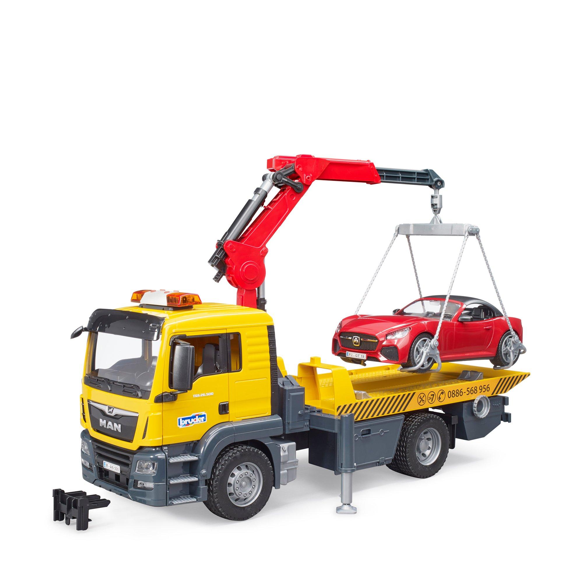 Image of MAN TGS Abschlepp-LKW mit Roadster und Light & Sound Modul Gelb