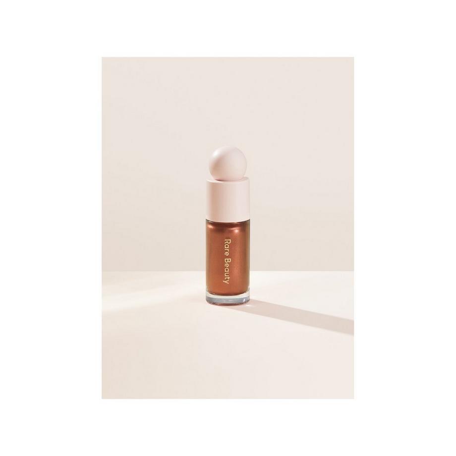 RARE BEAUTY  Positive Light - Highlighter liquido 
