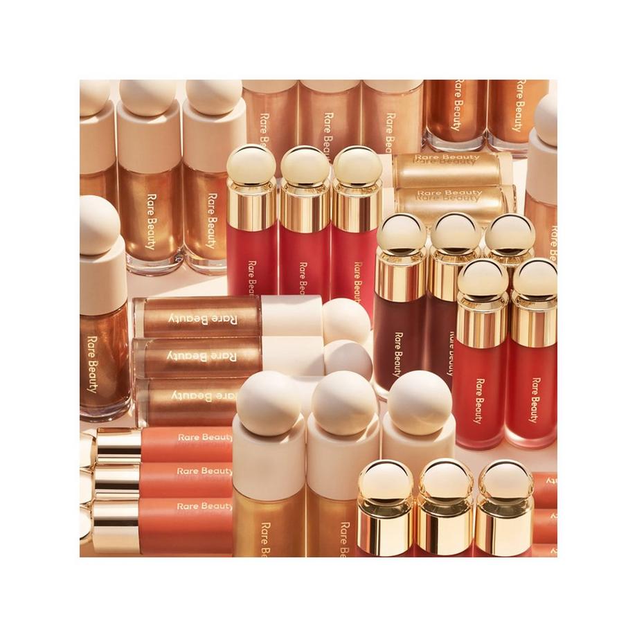 RARE BEAUTY  Positive Light - Highlighter liquide 