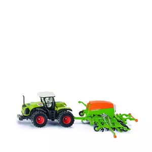 Traktor mit Sähmaschine