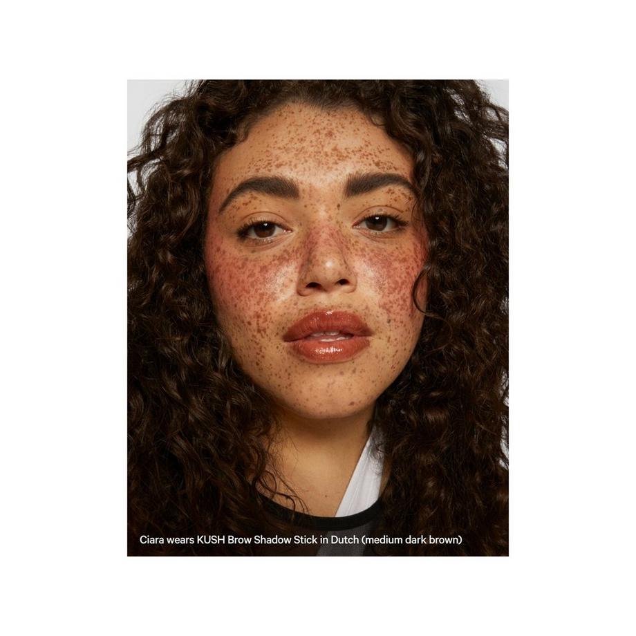 MILK  KUSH Cream-To-Powder Brow Shadow Stick - Stick per sopracciglia in crema-polvere 