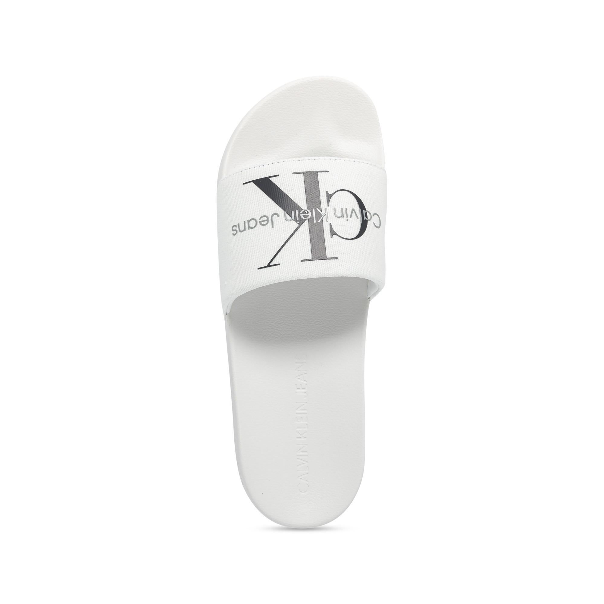 Calvin Klein SLIDE MONOGRAM CO Sandales de bain 