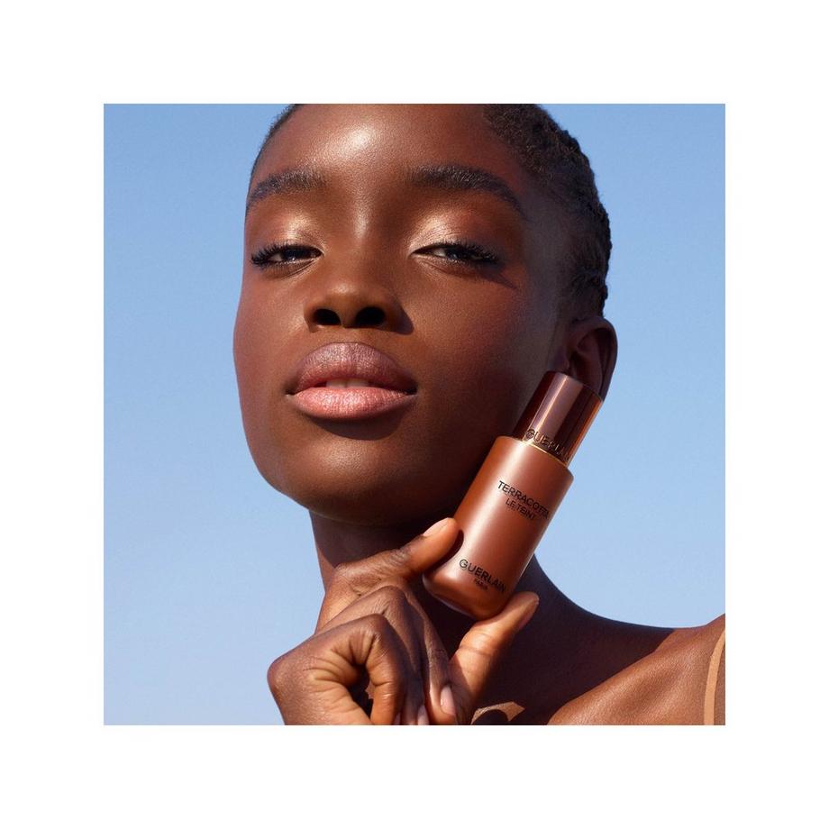 Guerlain Terracotta Concealer  Correcteur Perfection Naturelle Tenue 24h - Sans Transfert La perfection d’un fluide, la légèreté d’une poudre  