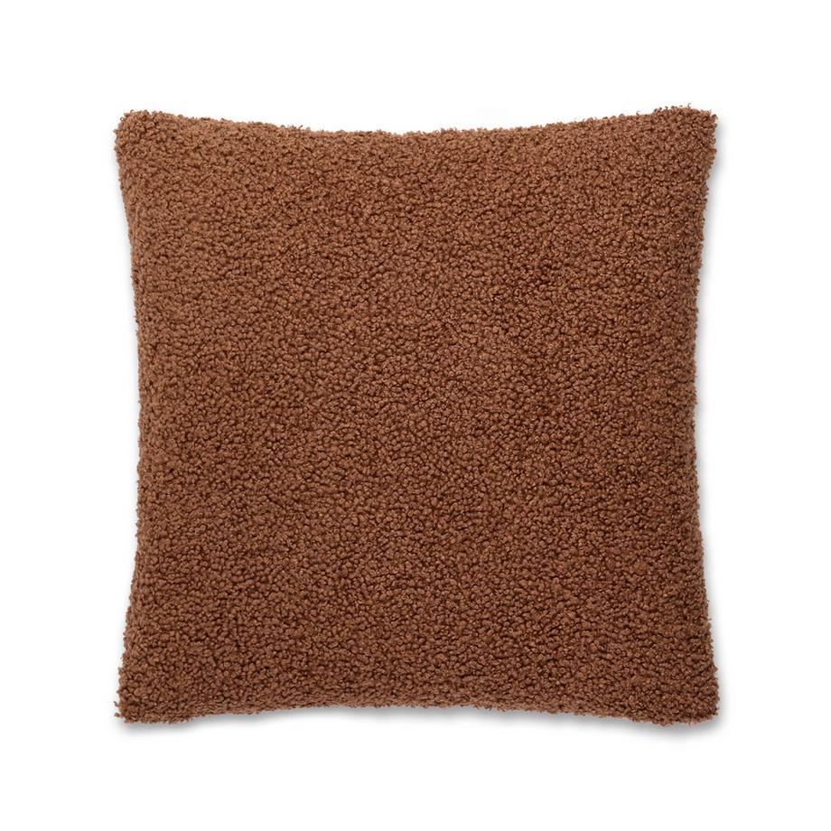 Coussin décoratif en fourrure synthétique