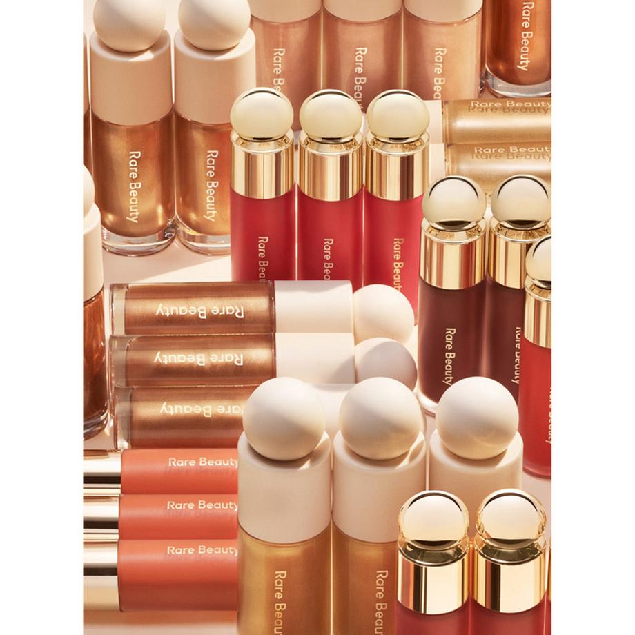 RARE BEAUTY  Positive Light - Highlighter liquido 