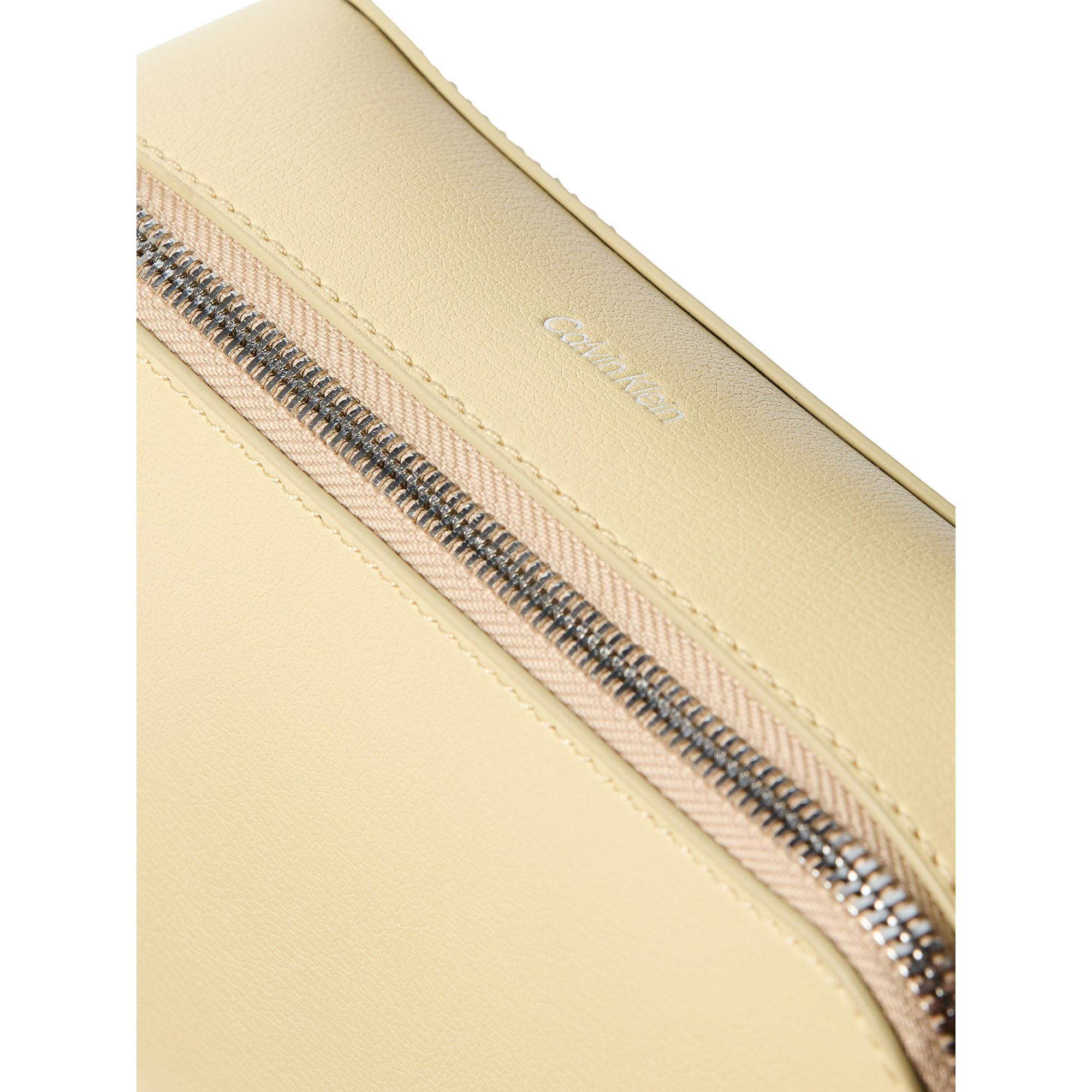 Calvin Klein Embossed Logo Elongated Camera Crossbody Bag  