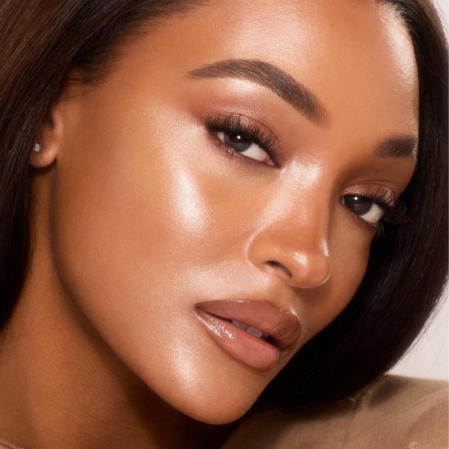 CHARLOTTE TILBURY  Unreal Skin Sheer Glow Tint - Fondotinta idratante in stick 