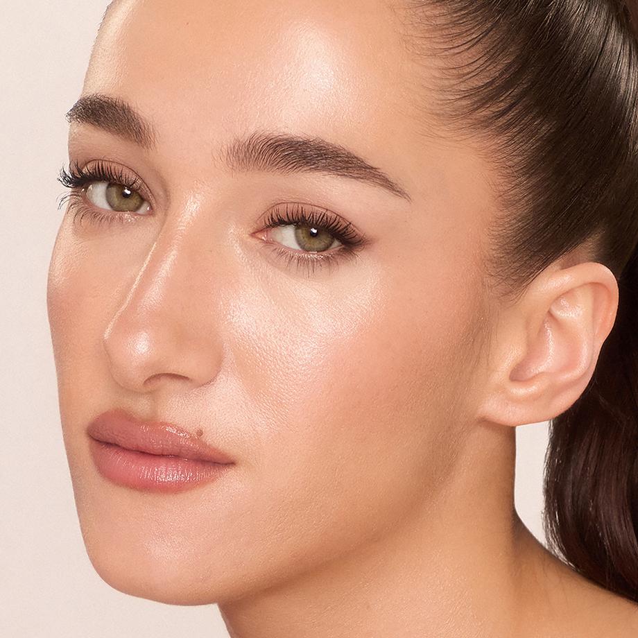 CHARLOTTE TILBURY  Unreal Skin Sheer Glow Tint - Fondotinta idratante in stick 