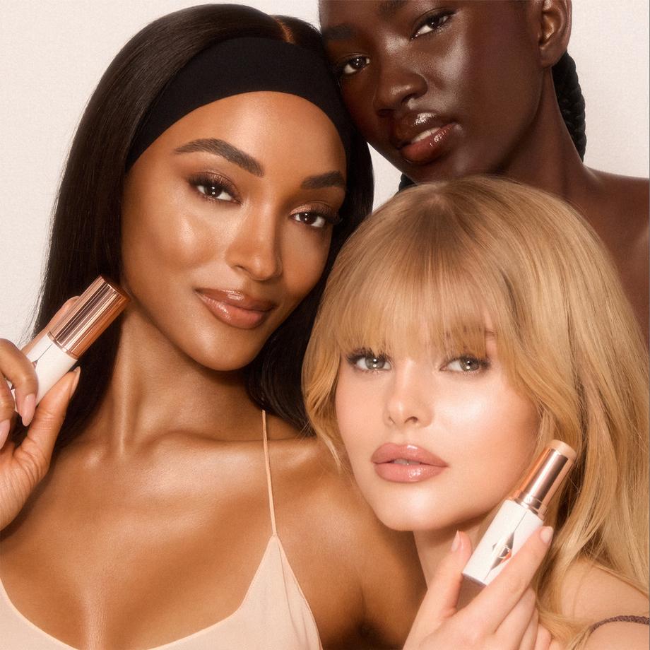 CHARLOTTE TILBURY  Unreal Skin Sheer Glow Tint - Stick Fond de Teint Hydratant 