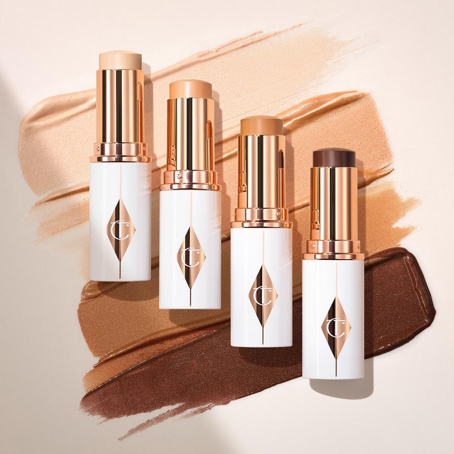 CHARLOTTE TILBURY  Unreal Skin Sheer Glow Tint - Stick Fond de Teint Hydratant 