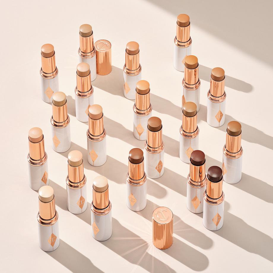 CHARLOTTE TILBURY  Unreal Skin Sheer Glow Tint - Stick Fond de Teint Hydratant 