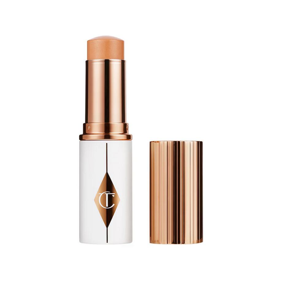 CHARLOTTE TILBURY  Unreal Skin Sheer Glow Tint - Stick Fond de Teint Hydratant 