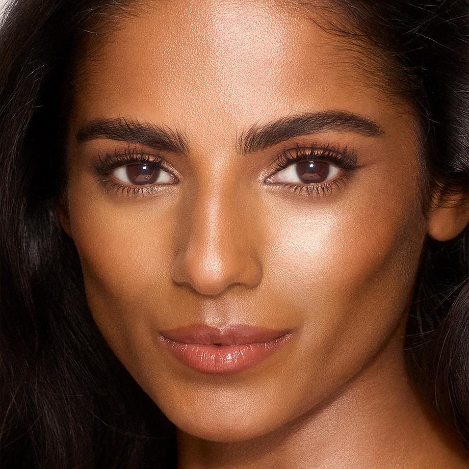 CHARLOTTE TILBURY  Unreal Skin Sheer Glow Tint - Stick Fond de Teint Hydratant 