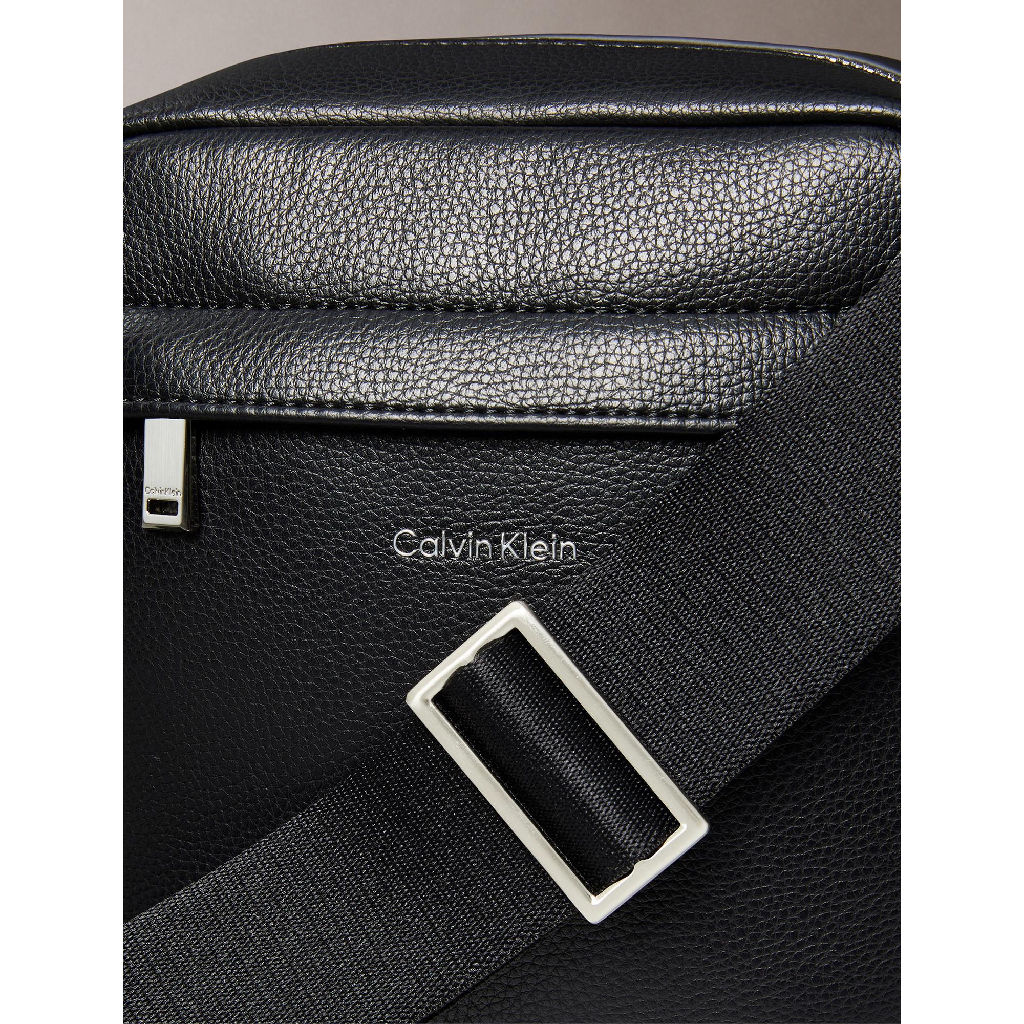 Calvin Klein Jeans Raised Logo Reporter Bag  