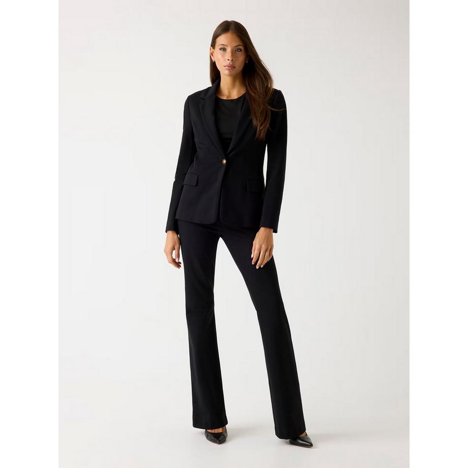 GUESS Pantaloni svasati Slim Fit con bottoni decorativi  