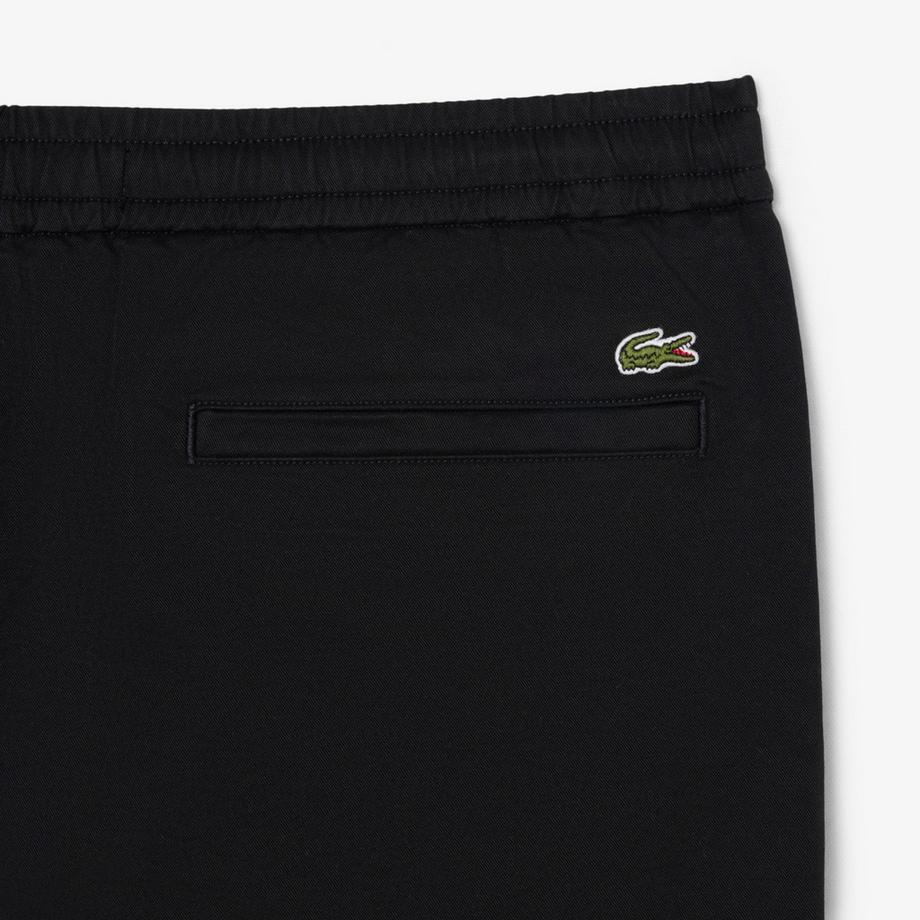 LACOSTE Pantaloni neri con vita elastica  