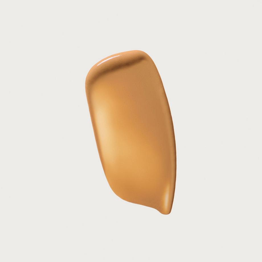 Merit Beauty  The Uniform - Fluide Solaire Minéral Teinté SPF 50 