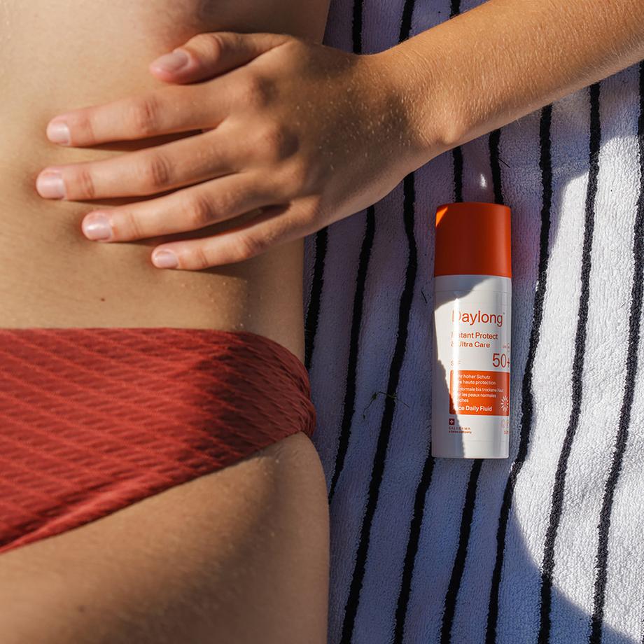 Daylong  Instant Protect & Ultra Care Visage Fluide quotidien teinté SPF 50+ 