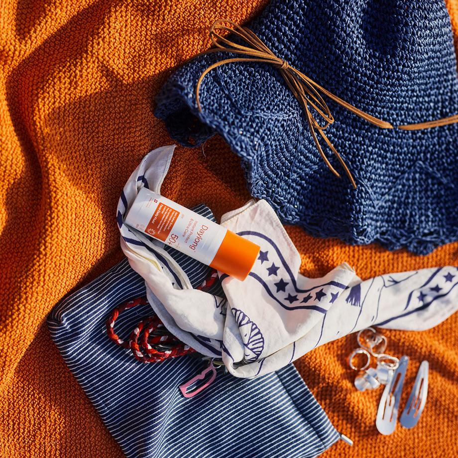 Daylong  Instant Protect & Ultra Care Visage Fluide quotidien teinté SPF 50+ 