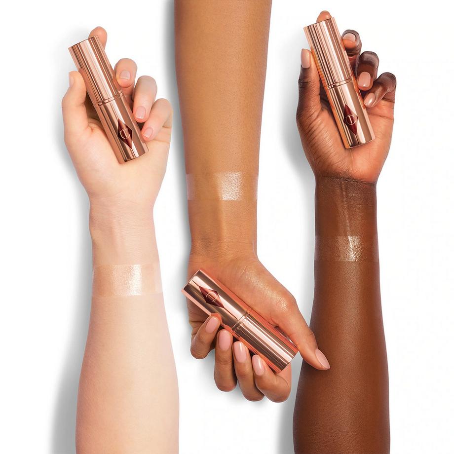 CHARLOTTE TILBURY  Unreal Highlighter Stick - Highlighter en stick 