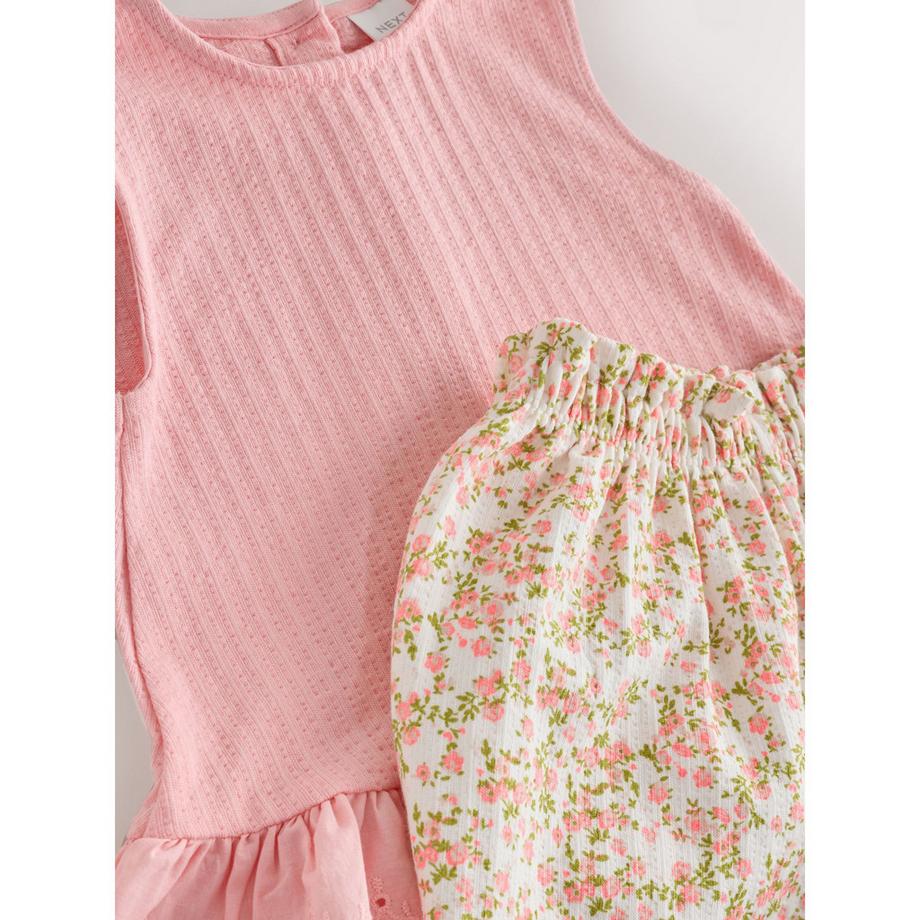 Next  Set: top e pantaloni 