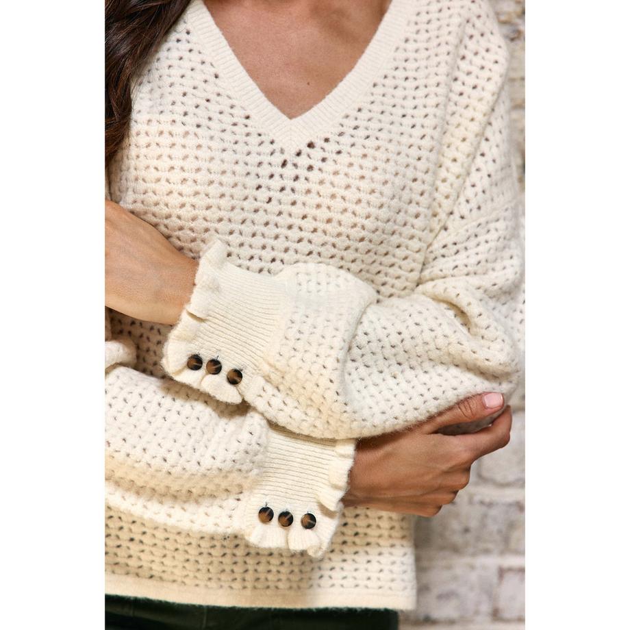 La Petite Etoile S Pull à col en V tricoté  