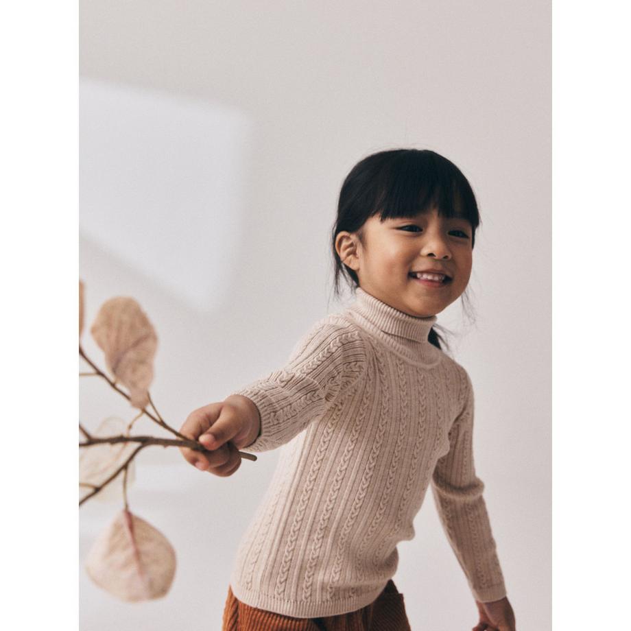 Next  Maglione 