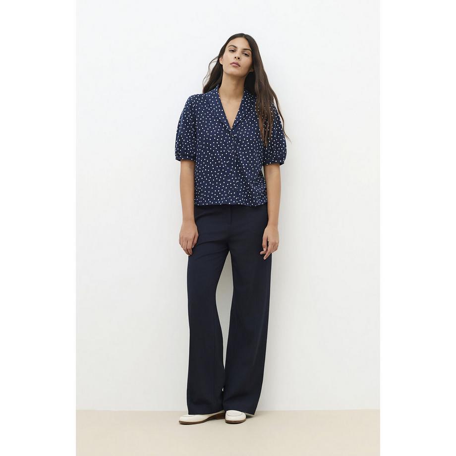 Caroll T-shirt a pois con collo a punta  