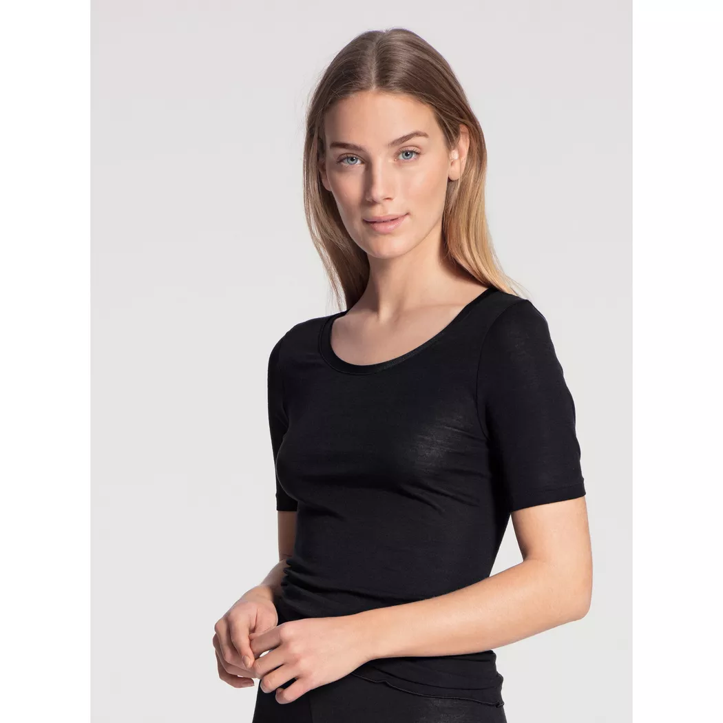 Kurzarmshirt CALIDA "True Confidence", Damen, Gr. L (48/50), schwarz, Rippware, Obermaterial: 70% Schurwolle, 30% Seide, unifarben, Basic hüftbedeckend, tiefer Rundhals, Shirts, Satinbandeinfassung, Rundhalsausschnitt, Kurzarm