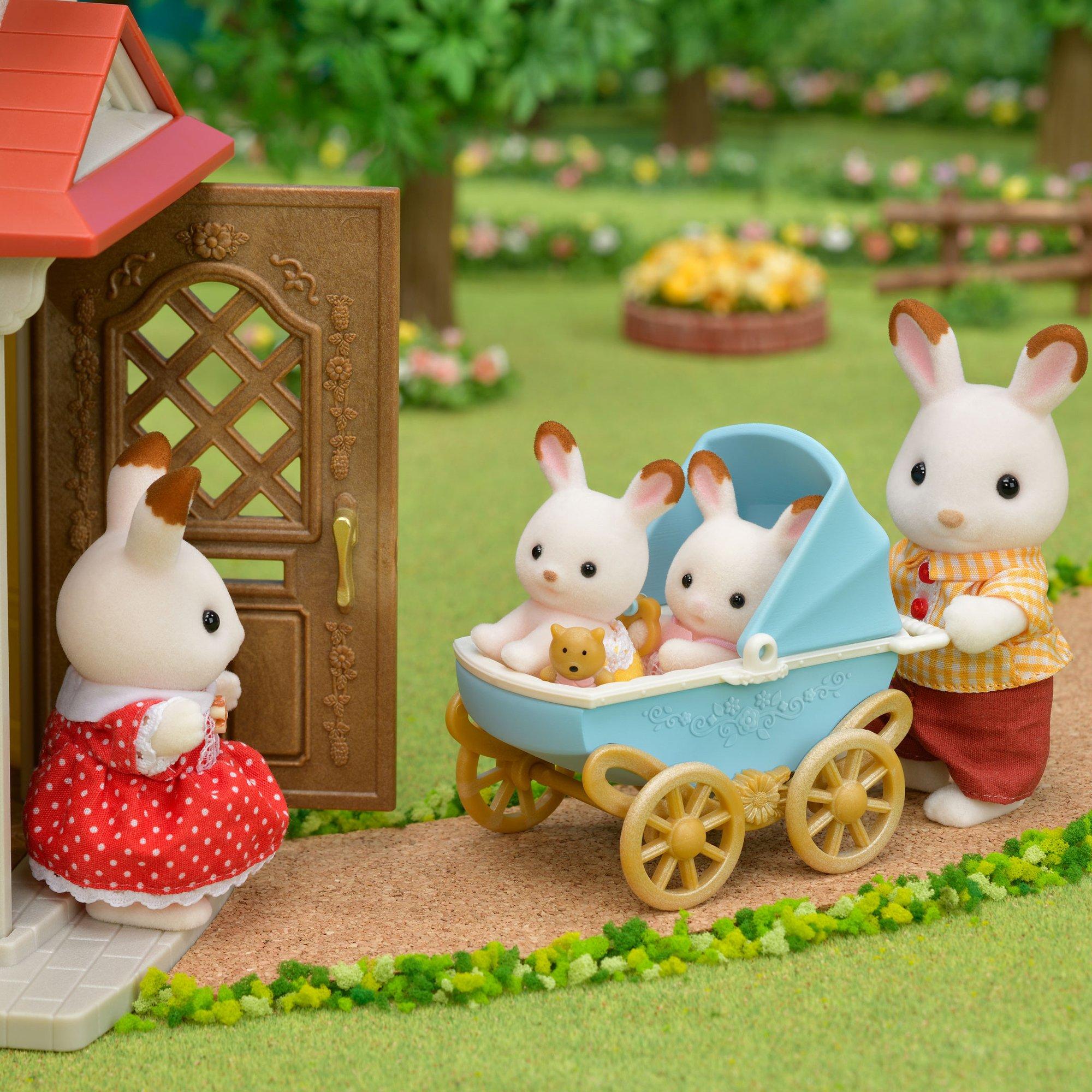 Sylvanian Families  Les jumeaux lapin chocolat et poussette double 