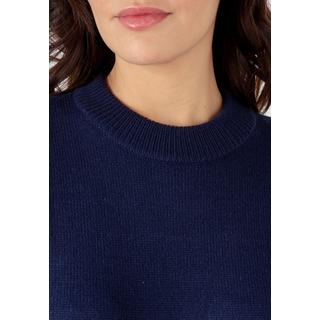 Damart  Pull col rond maille jersey souple. 