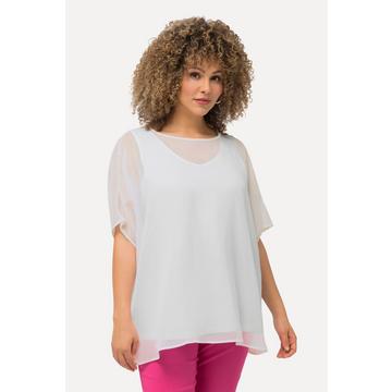 Blouse oversized en mousseline. Col rond et manches courtes