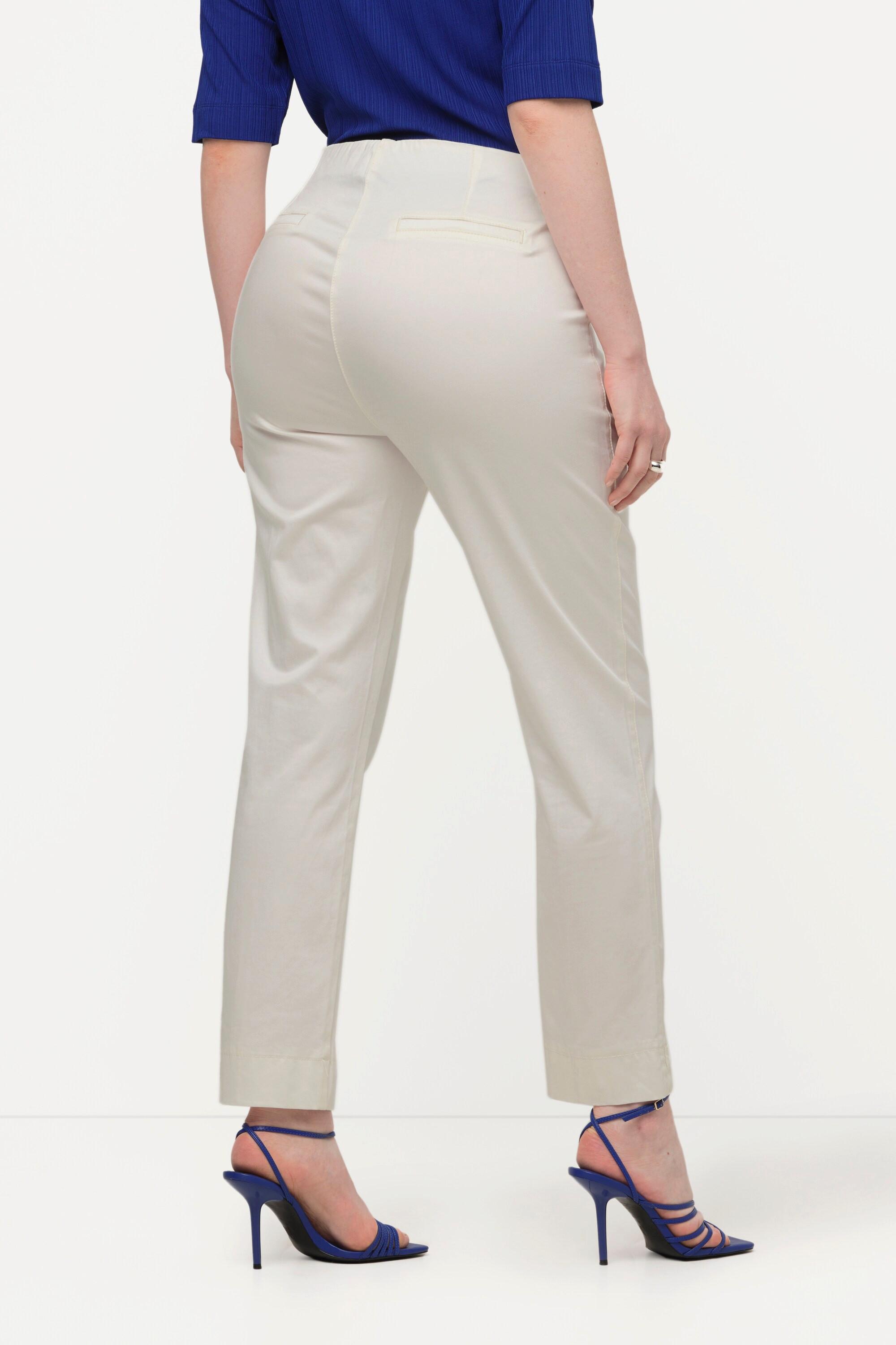 Ulla Popken  Pantalon avec passepoil et taille élastique. Coupe ajustée avec fente sur le bas de jambe. 