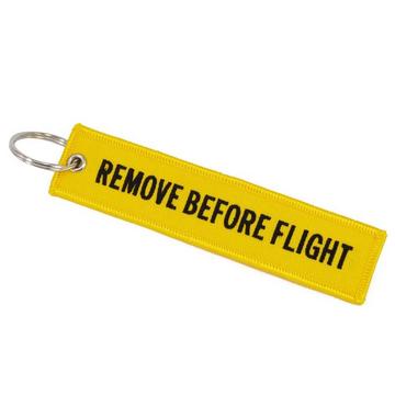 Porte-clés REMOVE BEFORE FLIGHT jaune